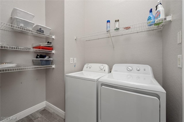 washroom featuring washing machine and dryer