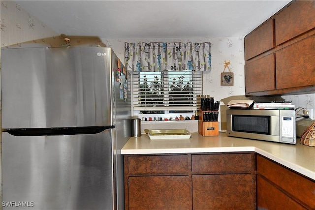 kitchen with appliances with stainless steel finishes