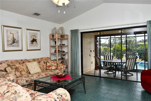 living room featuring vaulted ceiling