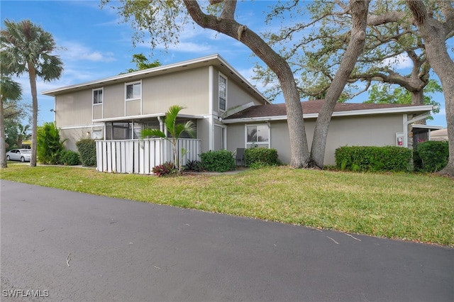 exterior space featuring a front lawn