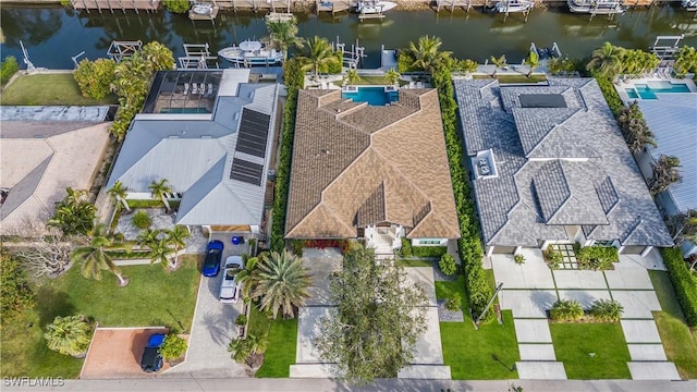 birds eye view of property featuring a water view