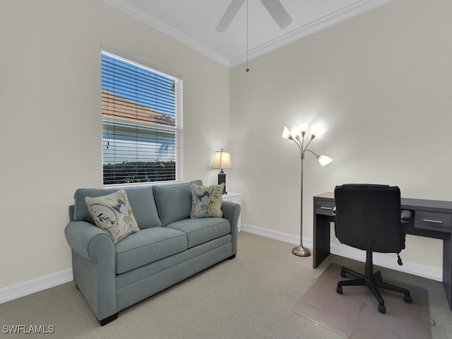 carpeted office space with crown molding and ceiling fan