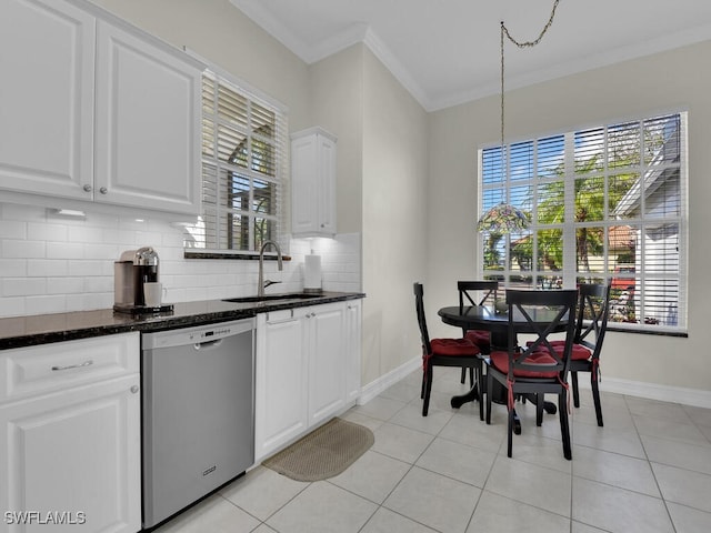 kitchen with dishwasher, sink, backsplash, white cabinets, and ornamental molding