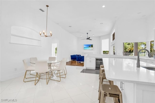 dining room featuring wine cooler, recessed lighting, visible vents, tile patterned flooring, and baseboards