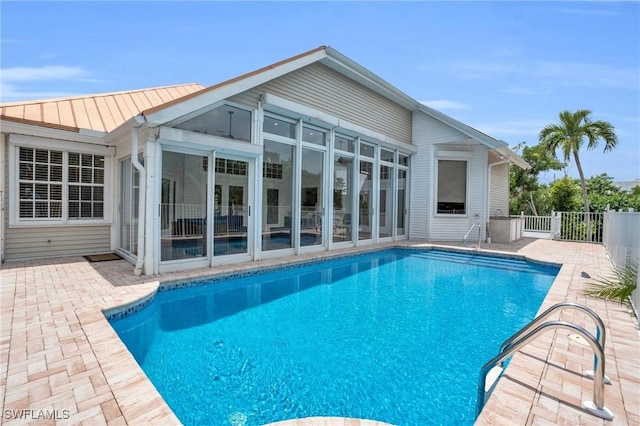 view of pool featuring a fenced in pool, french doors, fence, and a patio