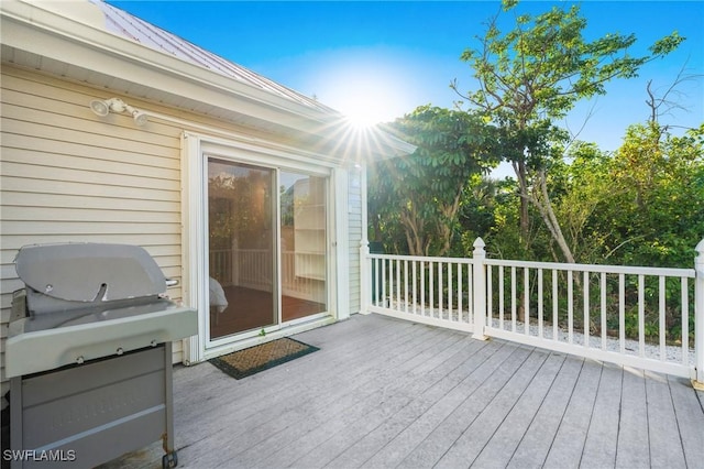 4090 W Gulf Dr, Sanibel, FL 33957 - wooden deck with a grill