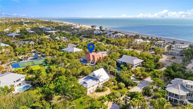 4090 W Gulf Dr, Sanibel, FL 33957 - drone / aerial view featuring a water view and a beach view