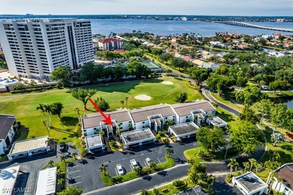 birds eye view of property featuring a water view