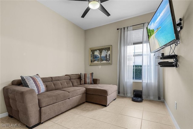 living room with light tile patterned flooring and ceiling fan