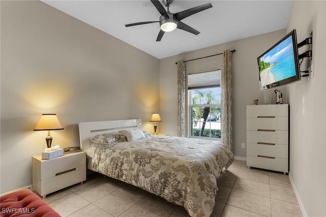 bedroom with light tile patterned floors and ceiling fan