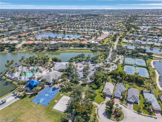 bird's eye view with a water view