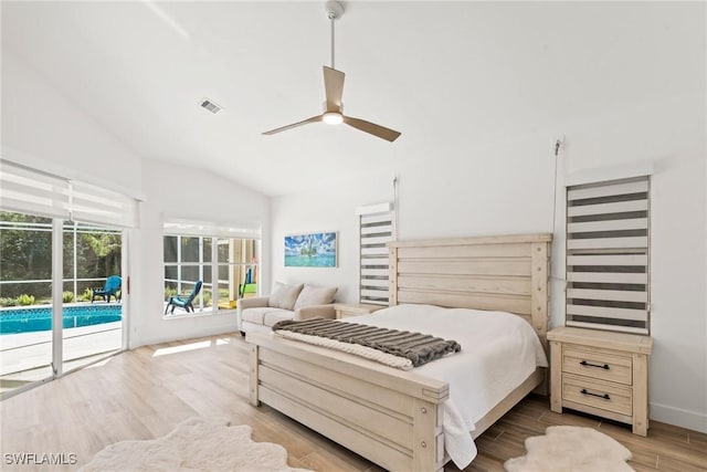 bedroom featuring vaulted ceiling, access to outside, ceiling fan, and light hardwood / wood-style floors