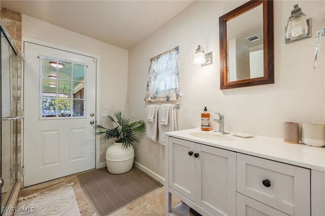 doorway to outside featuring sink