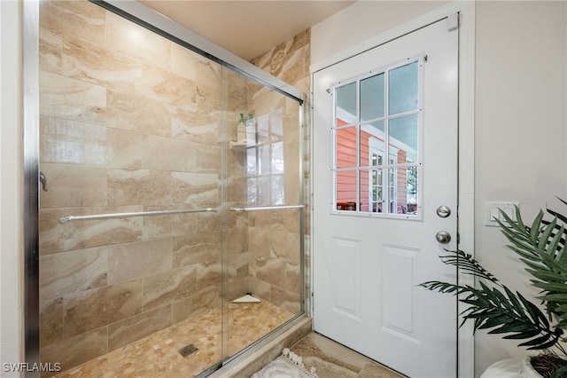 bathroom with an enclosed shower