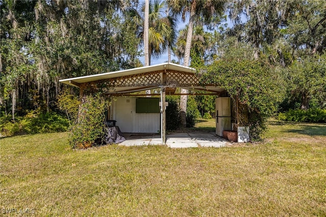 rear view of property featuring a yard