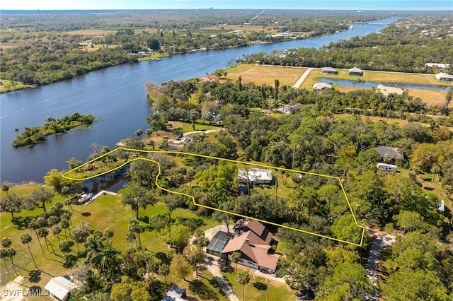 bird's eye view with a water view