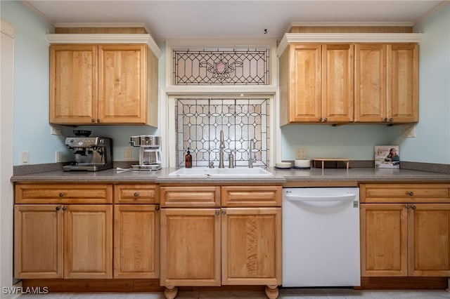 kitchen featuring dishwasher, sink, and crown molding