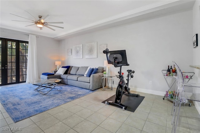 workout area featuring light tile patterned floors, crown molding, and french doors