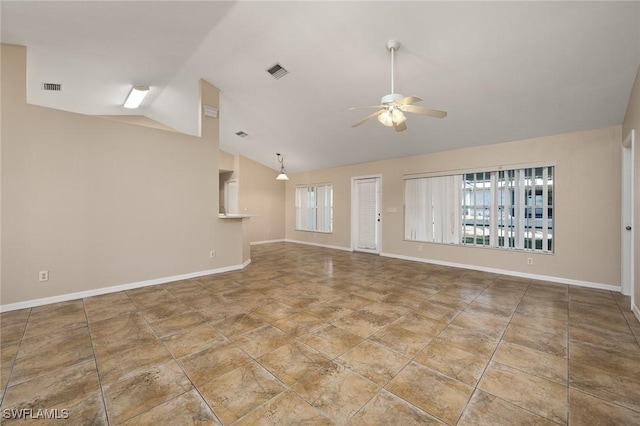 unfurnished living room with plenty of natural light, lofted ceiling, visible vents, and ceiling fan
