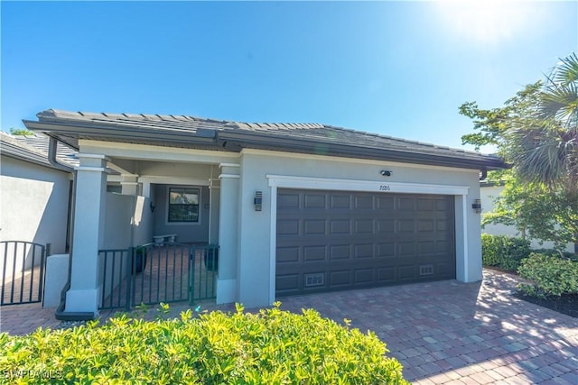 view of front of home featuring a garage