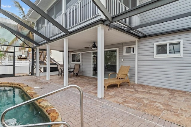 view of patio / terrace featuring ceiling fan