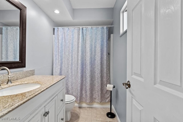 full bathroom with shower / tub combo, vanity, toilet, and tile patterned flooring