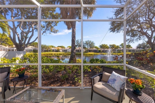 sunroom with a water view