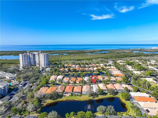 drone / aerial view with a water view