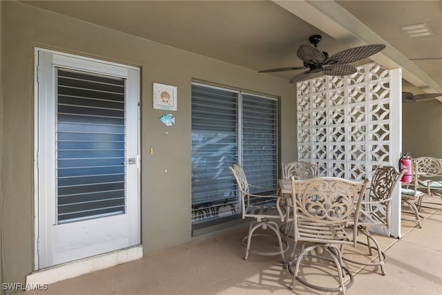 view of patio / terrace with outdoor dining space and ceiling fan