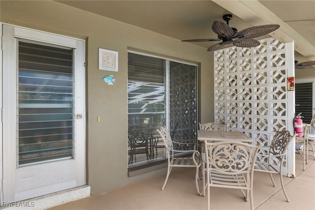 view of patio / terrace featuring ceiling fan and outdoor dining space