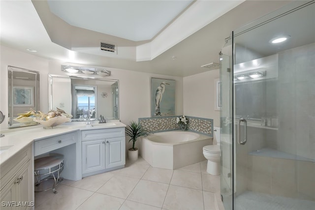 full bathroom featuring vanity, toilet, separate shower and tub, and tile patterned flooring