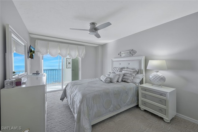 1020 S Collier Blvd Unit 203, Marco Island, FL 34145 - bedroom with light colored carpet, a ceiling fan, baseboards, and access to outside