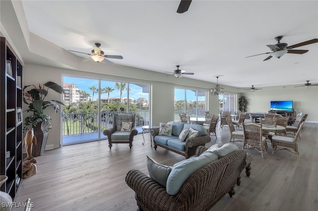 1020 S Collier Blvd Unit 203, Marco Island, FL 34145 - living area with ceiling fan and wood finished floors
