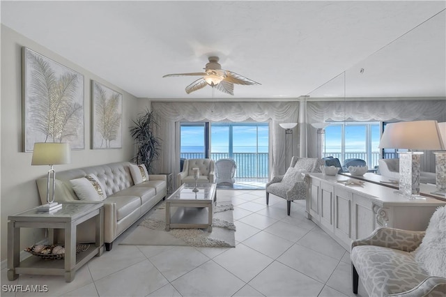 1020 S Collier Blvd Unit 203, Marco Island, FL 34145 - living room with plenty of natural light, ceiling fan, and light tile patterned flooring
