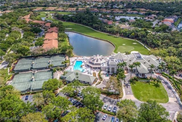 aerial view featuring a water view and view of golf course