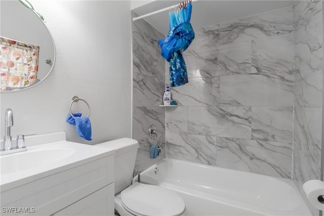 full bathroom with vanity, toilet, and tiled shower / bath combo