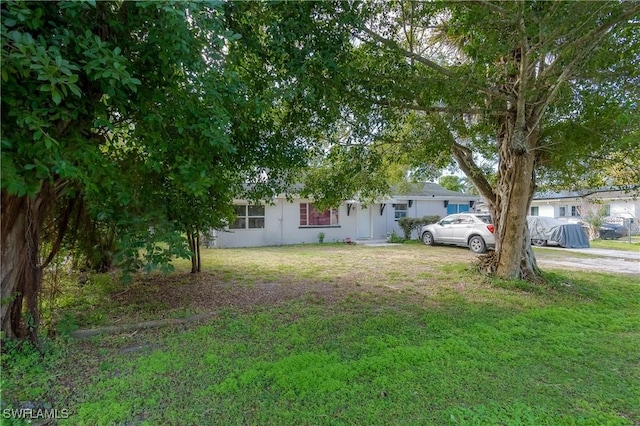 exterior space with a front yard