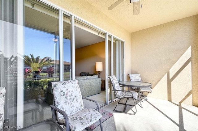 exterior space featuring ceiling fan