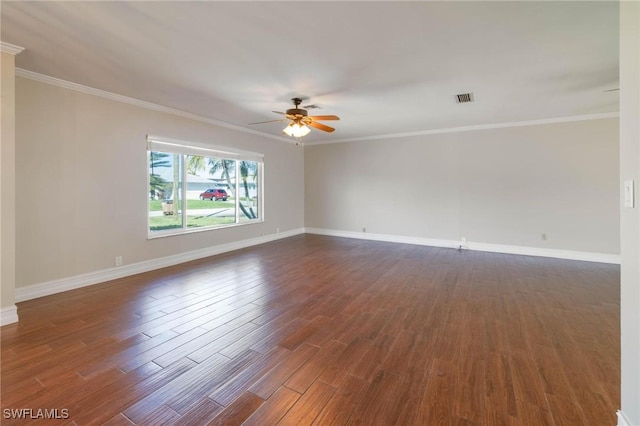 unfurnished room featuring crown molding, dark hardwood / wood-style floors, and ceiling fan