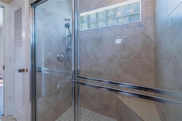 bathroom featuring walk in shower