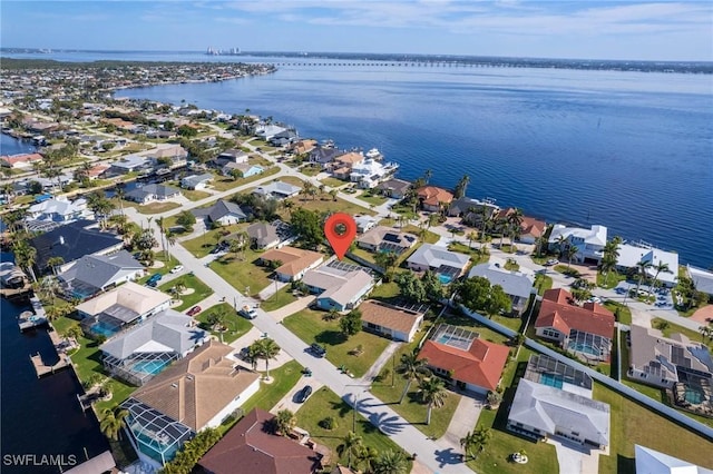 drone / aerial view featuring a water view