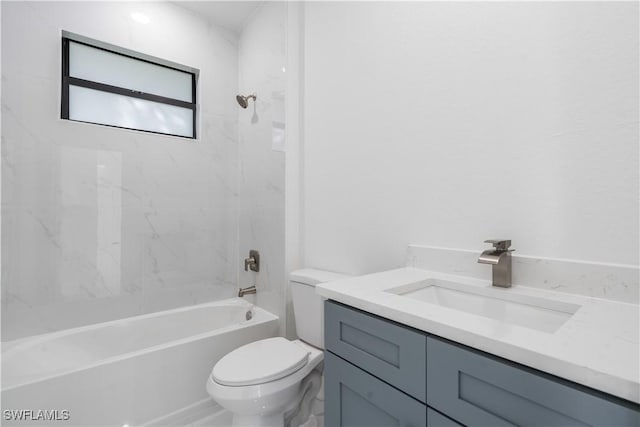 full bathroom with tiled shower / bath combo, vanity, and toilet