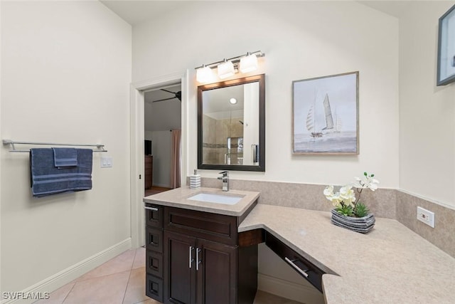 bathroom featuring vanity, tile patterned floors, and walk in shower