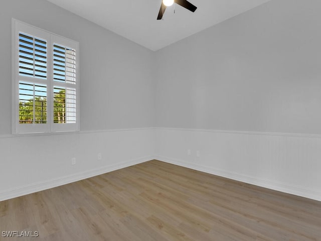 spare room featuring ceiling fan and light wood-type flooring