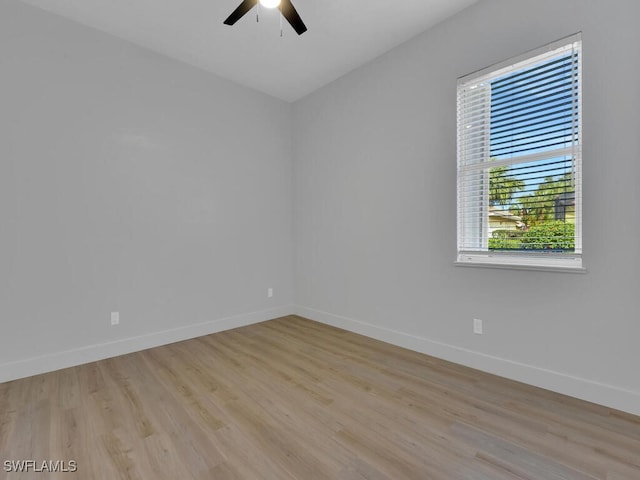 spare room with ceiling fan and light hardwood / wood-style floors