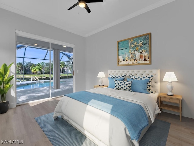 bedroom featuring access to exterior, crown molding, wood-type flooring, and ceiling fan