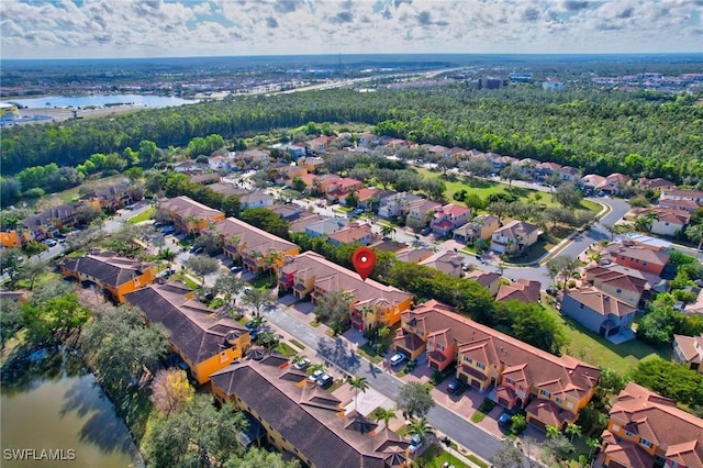 drone / aerial view featuring a water view