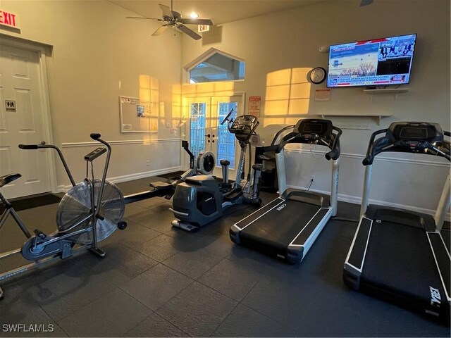 gym featuring french doors and ceiling fan