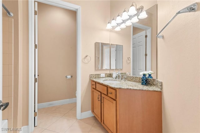 bathroom with walk in shower, tile patterned floors, toilet, and vanity