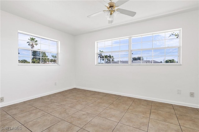 unfurnished room with ceiling fan